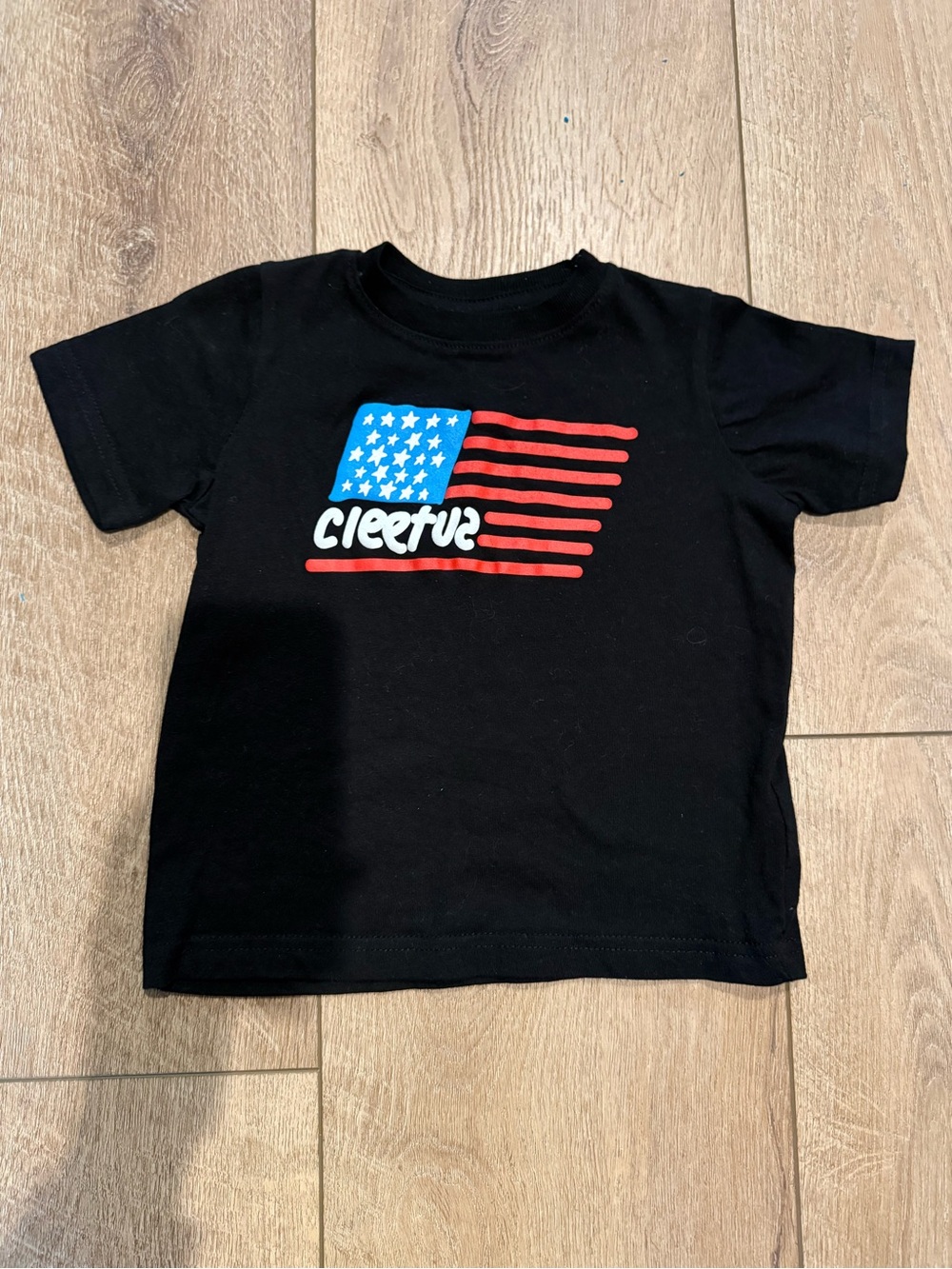 Cleetus Kids Black Tee with Red & Blue Flag Graphic -